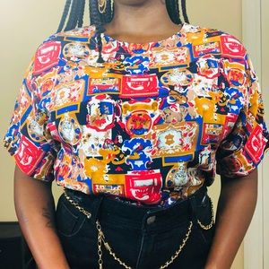 Multicolored print short sleeve blouse.